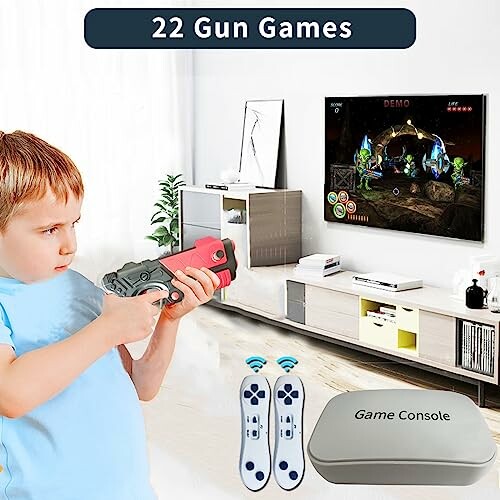 Boy playing gun games on TV with game console and controllers.