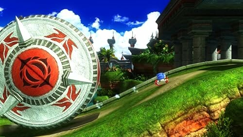 Sonic running from a giant wheel in a vibrant landscape.