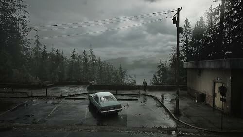 Desolate parking lot with an old car and forest backdrop.