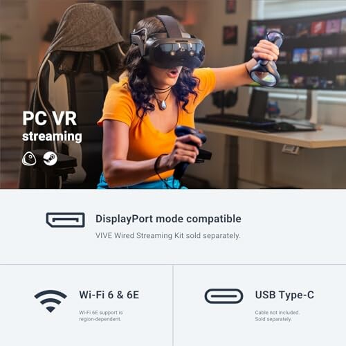 Person using VR headset with controllers in a gaming setup.